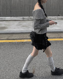 Reno Tiered Pleated Punching Mini Skirt