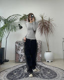 Heron embroidered denim pants