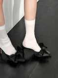 Bow tie mule heels