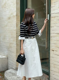 Tyne Cotton Two-Button Flare Long Skirt