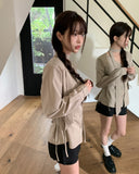 [Muffler set] Ir bean button side strap V-neck long sleeve blouse