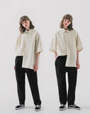 Deep tuck loose fit tapered banding pants