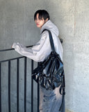 glossy string backpack