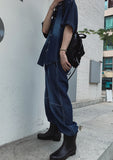 Incision circle washing denim pants