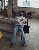 Left-washed flare denim pants