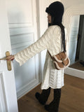 [MADE] Flute Ribbon Strap Punching Waves Knit One Piece