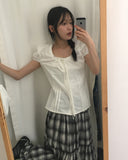 Roche pin tuck ribbon back strap button blouse