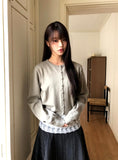 Uran bean button round neck long sleeve cardigan