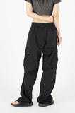 Pin-tuck nylon snap over cargo pants