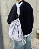 Sling bucket backpack