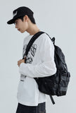 EYELET THREE-POCKET BUCKLE BACKPACK