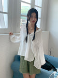 Morton back-slit see-through strap boxy fit long sleeve shirt