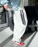 half-colored track pants