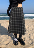 A BLACK CHECK SKIRT