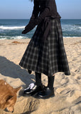 A BLACK CHECK SKIRT