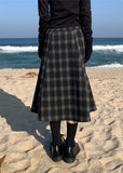 A BLACK CHECK SKIRT