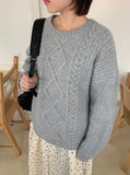 Kouni cable over round knit