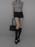 Reco coated leather shorts