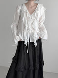 Plumel Ruffle V-Neck Blouse