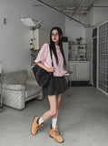 String striped over short-sleeved shirt