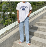 Half-bending semi-wide denim pants