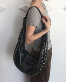 Retained eyelet leather cross shoulder bag