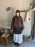 Kindrun Stitch Over Windbreaker