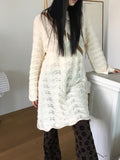 [MADE] Flute Ribbon Strap Punching Waves Knit One Piece