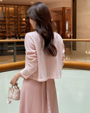 Kiet V-neck pendant knit cardigan