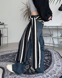 Pad snap button denim pants