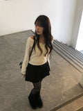 Krang Wool Pleated Mini Belt Skirt