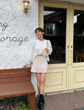 Meringue pintuck shirred blouse