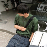 Cable knit short sleeve henry neck ver