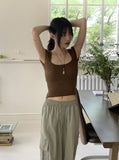 Kundi back slit strap boucle short sleeve knit