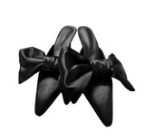 Bow tie mule heels