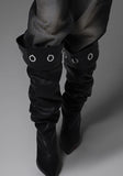 Big eyelet long boots heel
