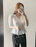 Betty V-neck Embossed Wrinkle Peplum Blouse