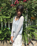 Ate frill punching see-through cardigan