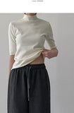 Mock neck three-quarter knit T-shirt