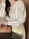 Pezzling Ribbon Round Blouse