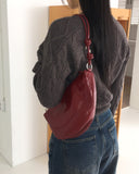 Quone half-moon leather shoulder bag