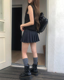Noki Striped Pleated Mini Skirt