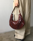 Tenka eyelet strap leather shoulder bag