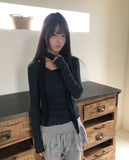 Burin Punched Wavy V-Neck Knit