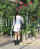 Ate frill punching see-through cardigan