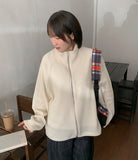 Nekimo string ribbed knit zip-up cardigan