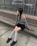 Reno Tiered Pleated Punching Mini Skirt
