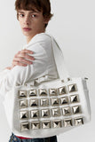 oversize studded shoulder bag