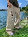 Neutral Beige Destroyed Denim Jeans