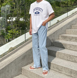 Half-bending semi-wide denim pants